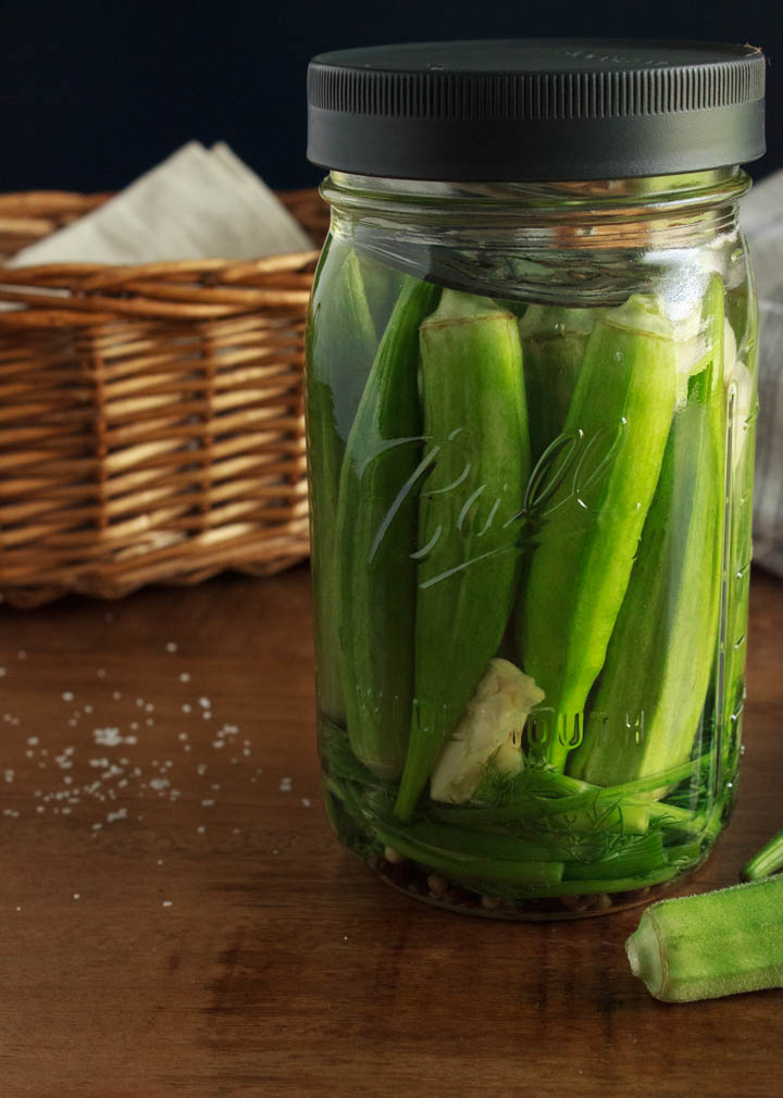 Jar of okra fermenting on the table