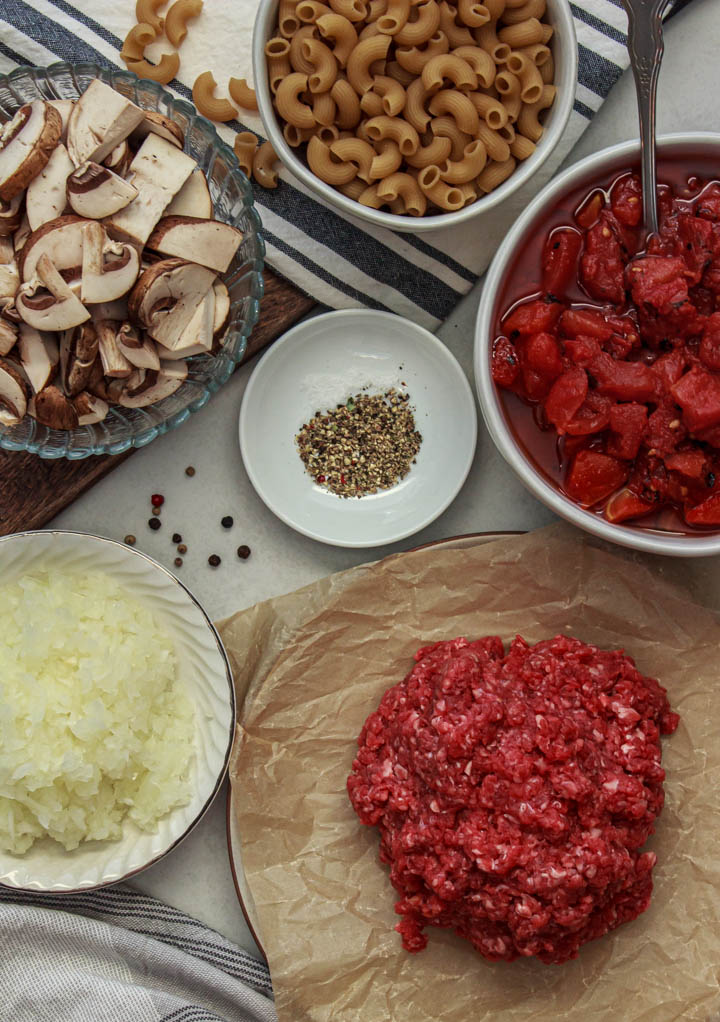 Hamburger and Macaroni Ingredients: gluten-free elbow pasta, grass-fed ground beef, fire-roasted diced tomatoes, diced onion, sliced mushrooms, salt and pepper.