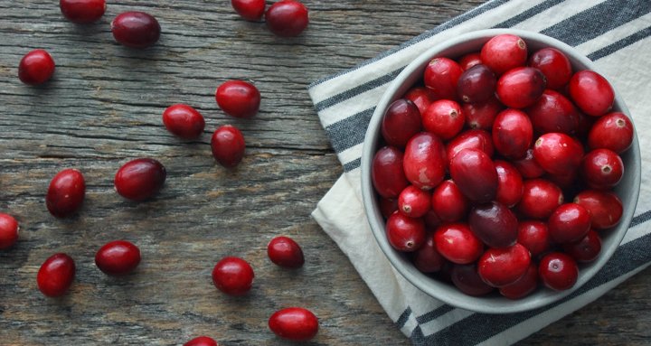 Organic Cranberries scattered on a table