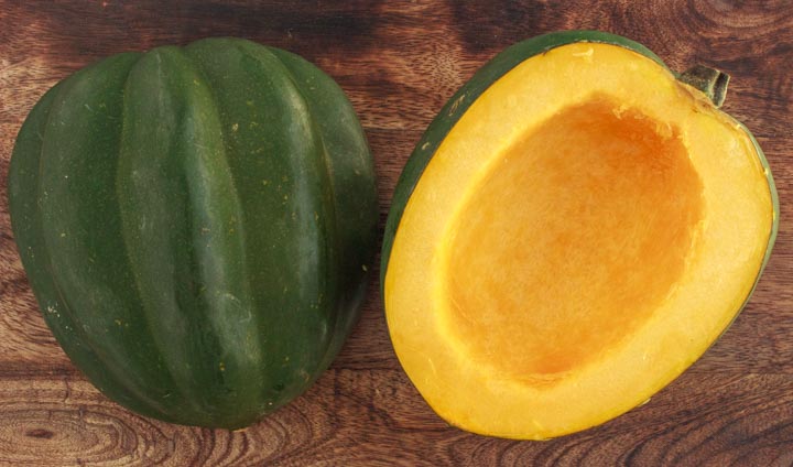 Acorn squash cut in half and view inside with seeds removed