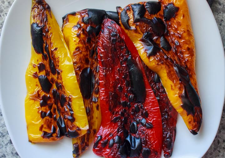 Roasted sweet peppers before the skins are removed