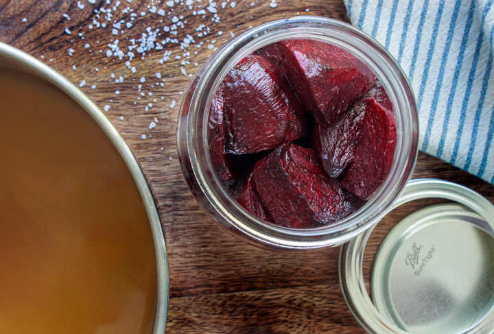 Roasted beets in a jar plus a pot of pickling liquid