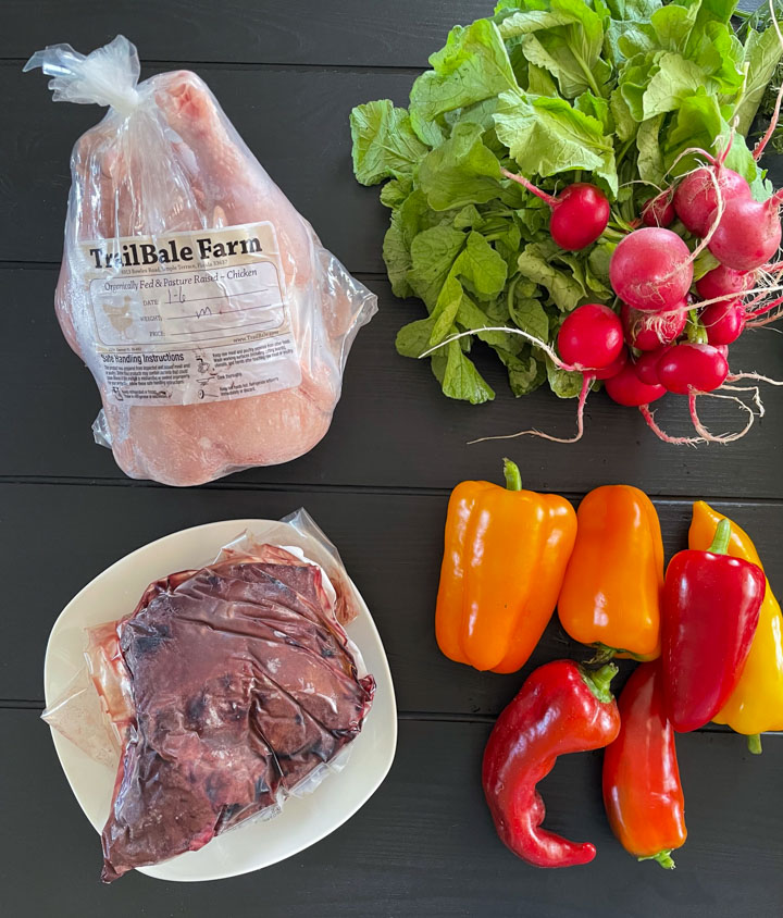 Whole chicken and grass fed liver from the farmers market. Plus some vegetables.