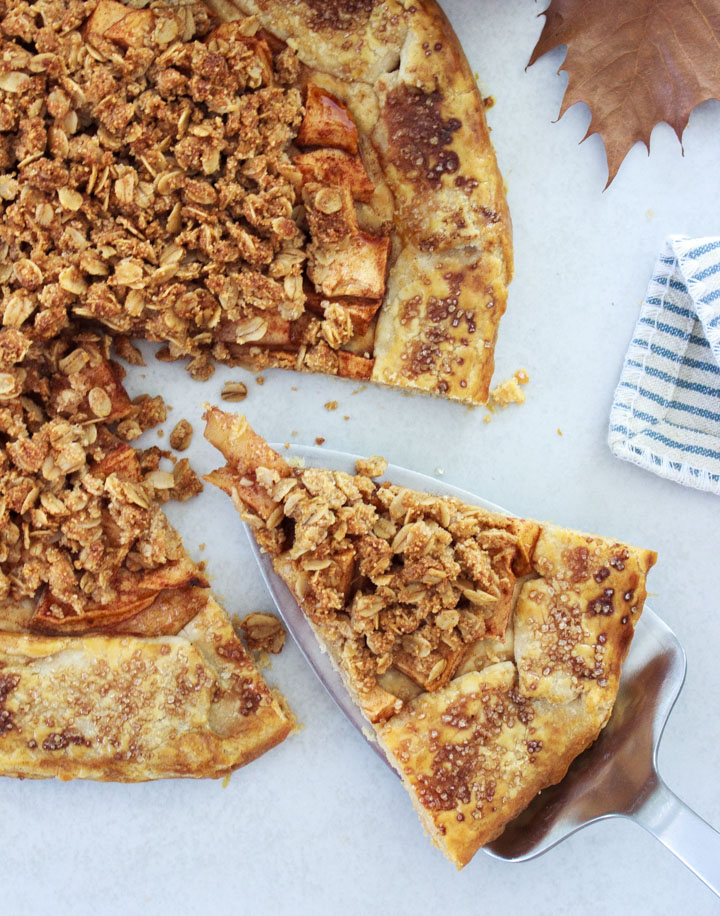 A slice of apple galette with sweet crisp topping