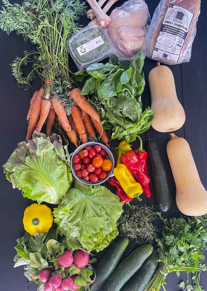 Farmers market haul from the Saturday Morning Market in St. Petersburg - includes chicken, butternut squash, carrots, lettuce and sweet peppers