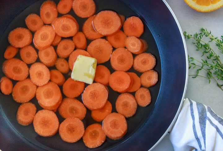Photo showing how much water to use when glazing carrots on the stovetop