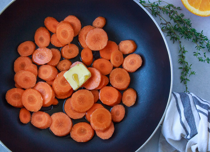 Ingredients for maple glazed carrots in the pan