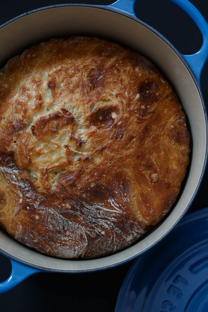 Boule of homemade bread in a dutch oven