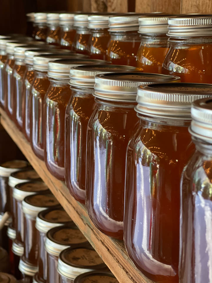 Jars of local honey on a store shelf