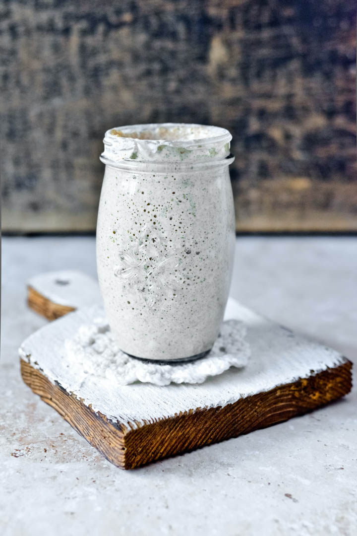 Active sourdough starter in a jar