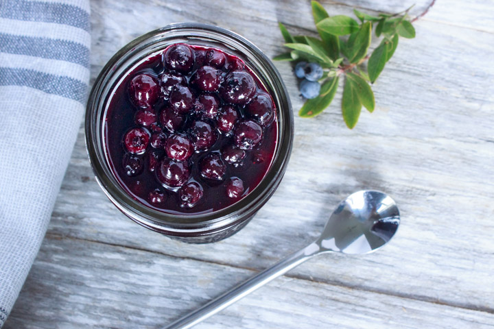 A jar of homemade blueberry compote