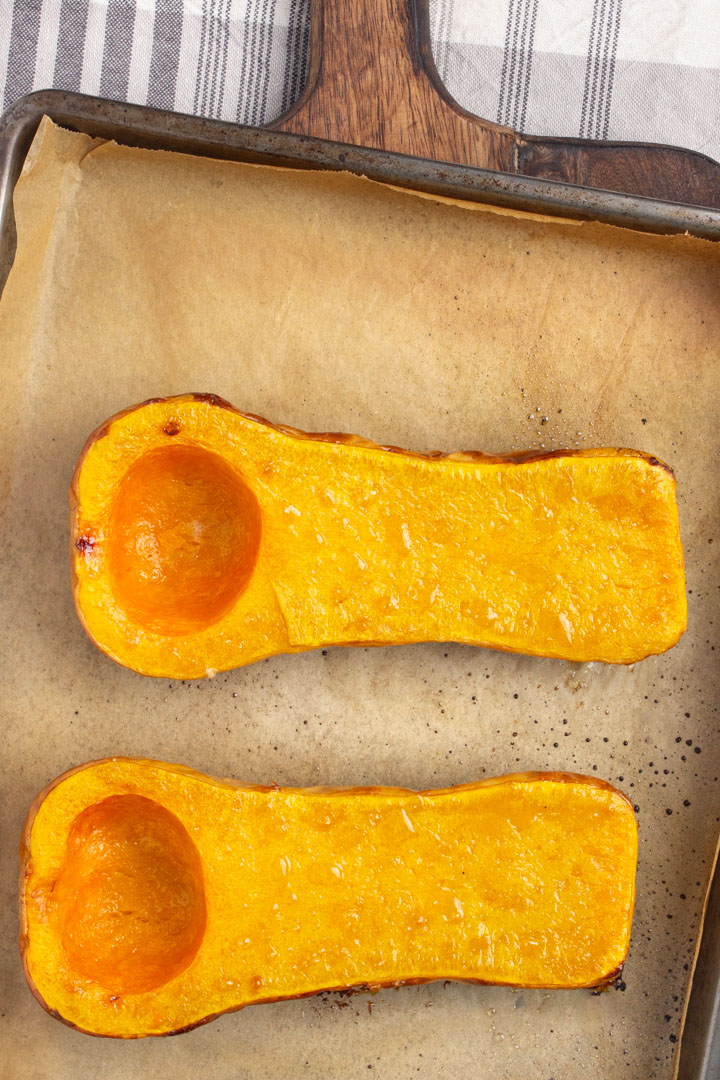 How to Cook Butternut Squash in the Oven - photo shows two butternut squash halves fresh from the oven.