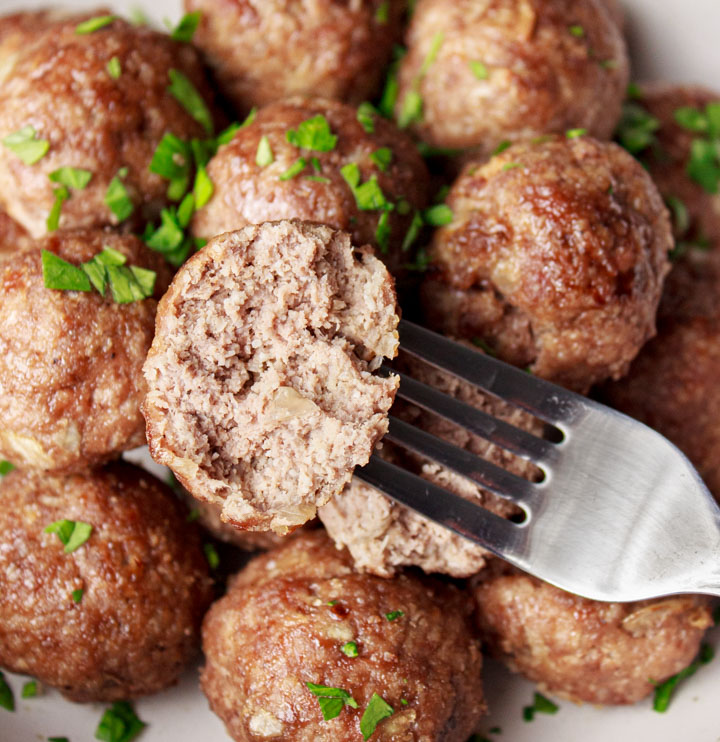 Closeup showing the inside of these grass-fed beef meatballs made without eggs